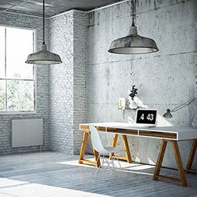 Estudio de diseño y arquitectura con lámparas industriales