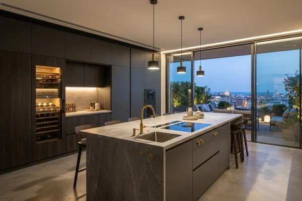 Reforma de cocina de lujo con gran isla de cuarcita y vinoteca en Sarrià Barcelona